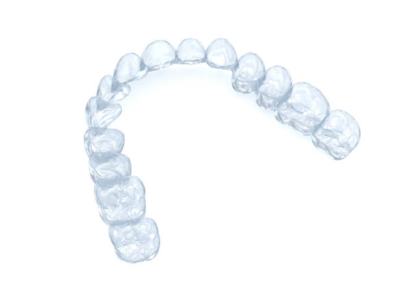 istock Invisalign braces or invisible retainer on white. Medically accurate dental 3D illustration 1312577677
