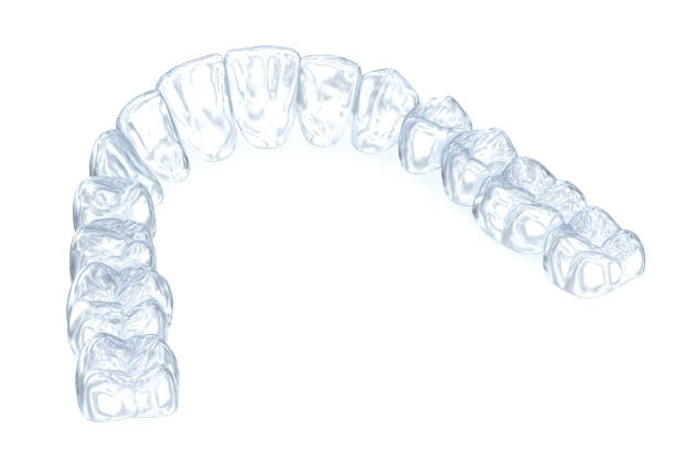 istock Invisalign braces or invisible retainer on white. Medically accurate dental 3D illustration 1312577679