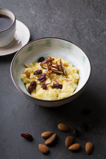 istock Cooked porridge served with almonds in a bowl 1312577720