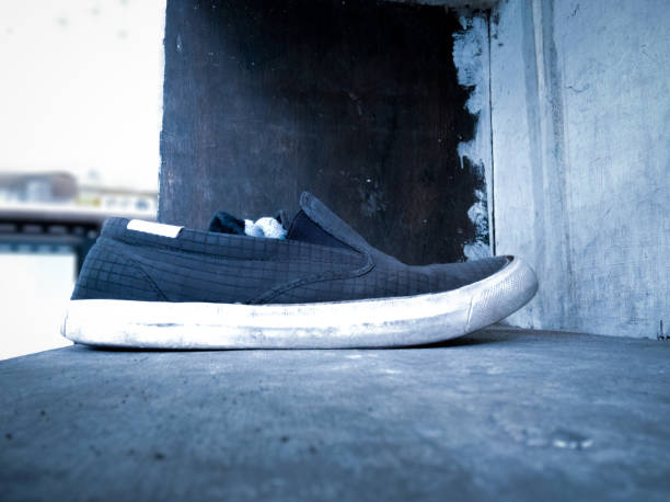 Side view of slipon sneakers with socks