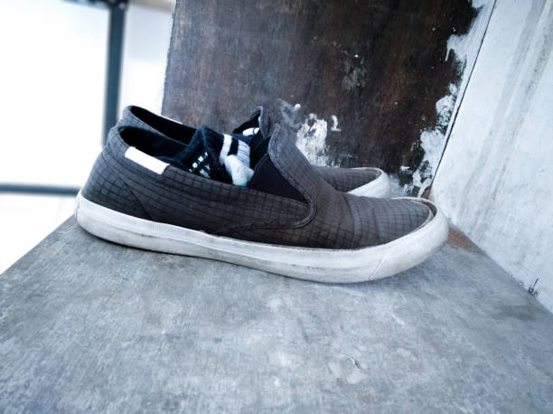 istock Side view of slipon sneakers with socks 1312586033