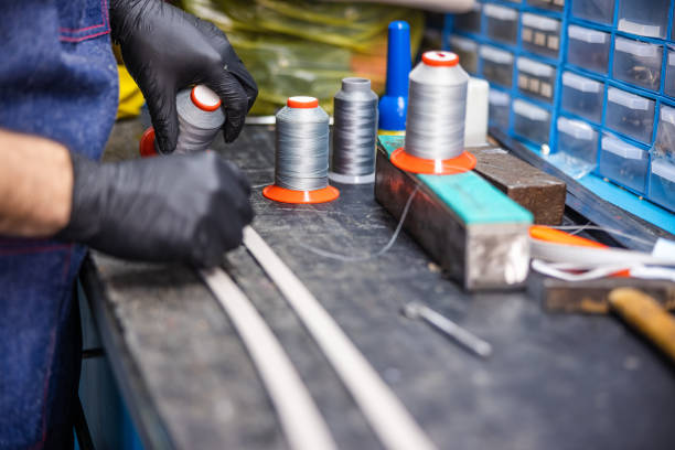 istock Preparing material on workbench in repair shop 1312587195