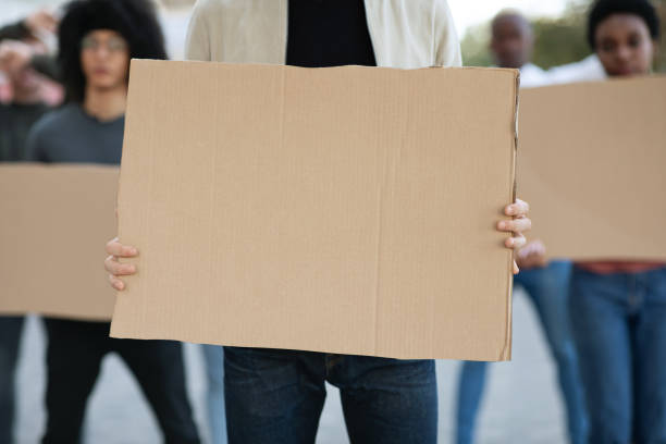 istock Empty placards of demonstrators protesting on the street, closeup 1312602214
