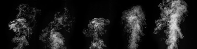 Set of fog or smoke on a black background. Abstract background, design element. White cloudiness, mist or smog background
