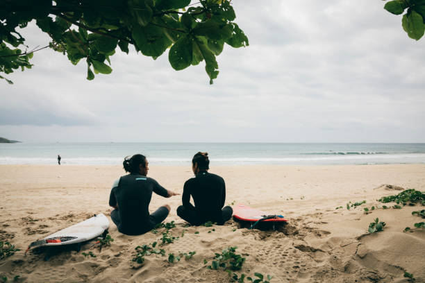 istock Go surfing with friends 1312609750