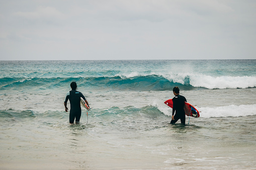 Go surfing with friends