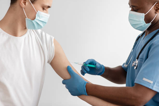 istock Protect health from covid-19 virus and population vaccination 1312611216