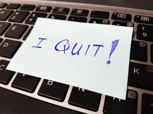 istock Quitting a job concept using a sticky pad with the word 