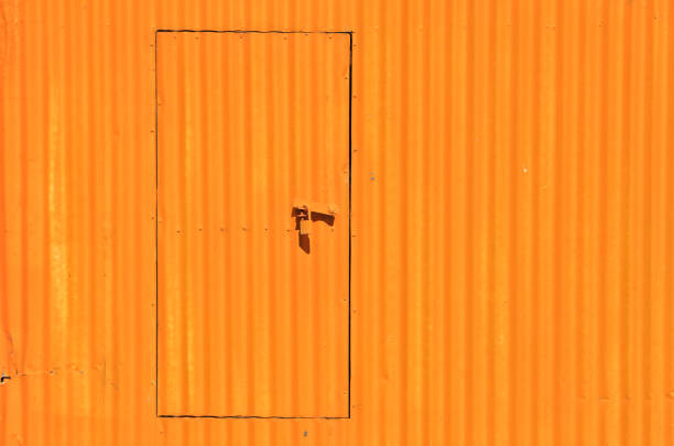 istock Door Entrance Outdoors Corrugated Iron Yellow Background 1312613433