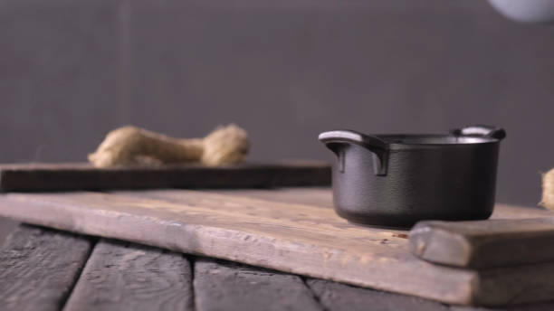 istock A wooden tray with a black pot on the table 1312615858