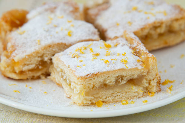 istock Lemon pie with filling, icing sugar and lemon zest 1312618059