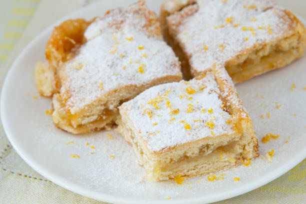 istock Lemon pie with filling, icing sugar and lemon zest 1312618063