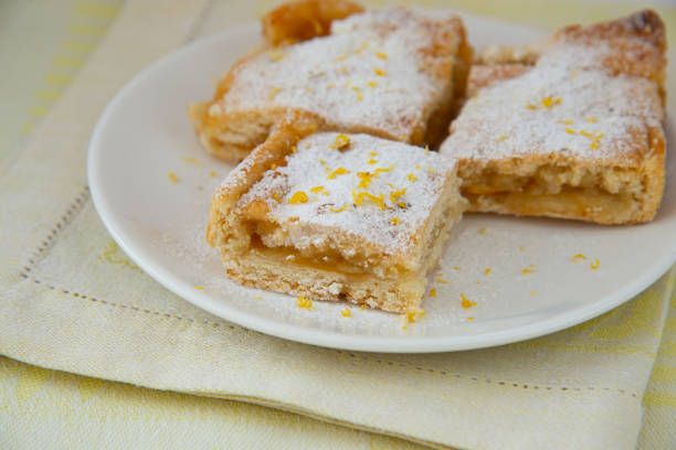 istock Lemon pie with filling, icing sugar and lemon zest 1312618067