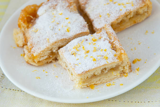 istock Lemon pie with filling, icing sugar and lemon zest 1312618346
