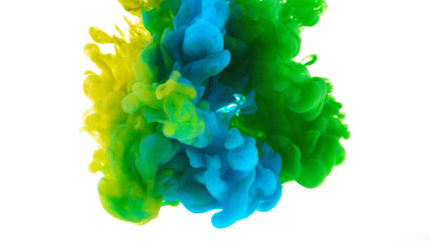 istock Close-up of paint dissolving in water 1312620933