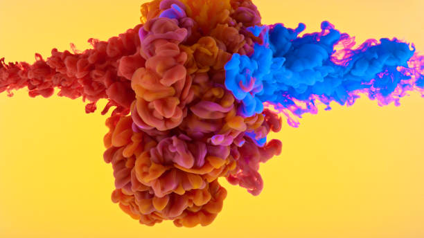 istock Close-up of paint dissolving in water 1312621115