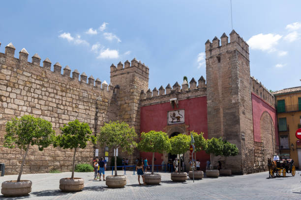 Puerta del León in the center of Seville. Seville, SPAIN - July 22 2020: Puerta del León in the center of Seville. Is the main entrance to the Alcázar and takes its name from the 19th century. el alcazar palace seville stock pictures, royalty-free photos & images