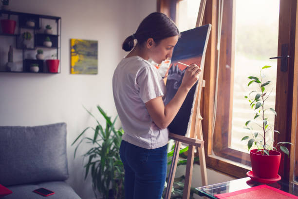 istock Young beautiful female artist 1312624775