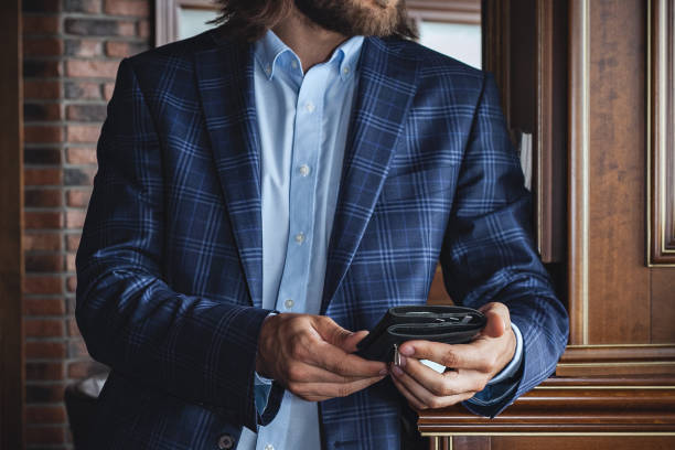 istock A business man with a wallet in the interior 1312628854