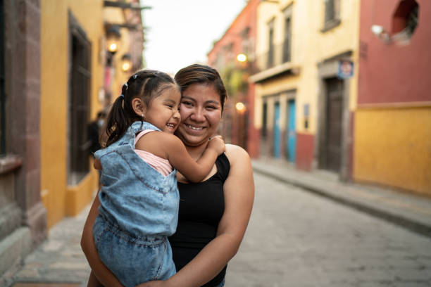 portrait of mother and daughter outdoors - mexican ethnicity imagens e fotografias de stock