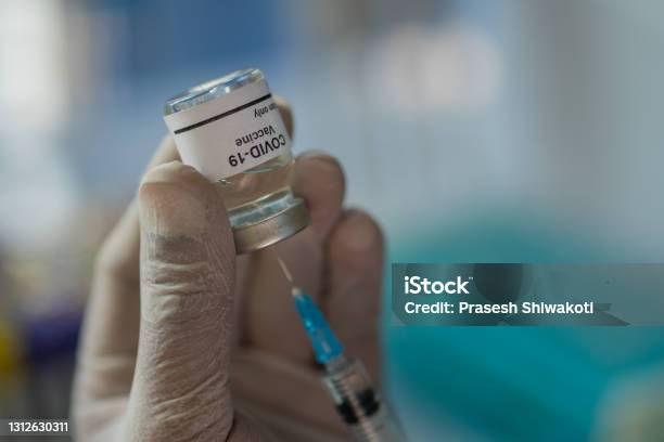 Coronavirus Covid19 Vaccine Stock Photo Stock Photo - Download Image Now - Anti-vaccination, Hand, Adult