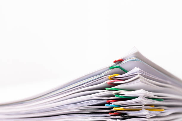 istock Close-up of Stack Group of report papers Document clipped in color clips with copy space, business and education concept. 1312631153