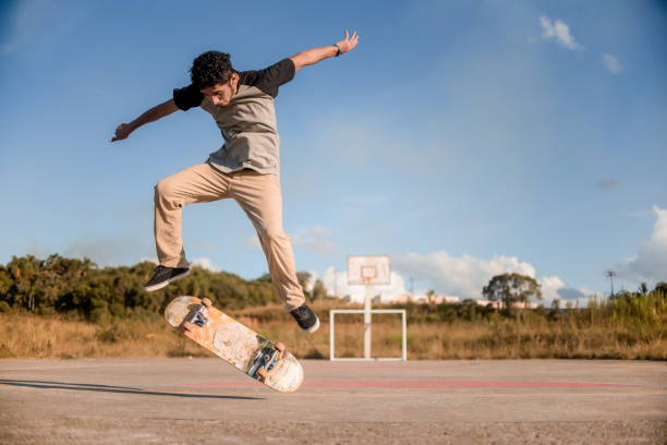 istock Young man doing maneuvers with his skateboard. 1312632719