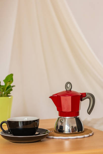 istock Espresso coffee and coffee pot indoors 1312636181
