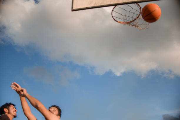 istock Friends playing basketball 1312637280