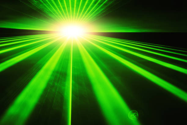 istock Nightclub laser makes dramatic abstract pattern in haze from a smoke machine 1312638747