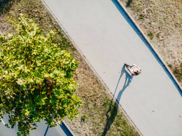 istock Woman driving electric scooter 1312640453