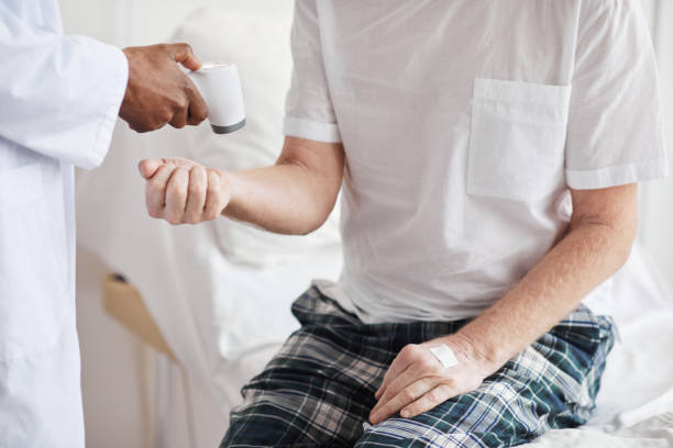 istock Temperature Check in Hospital 1312641944