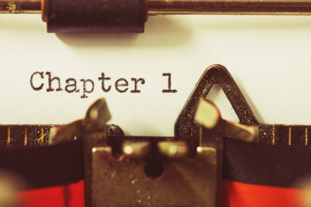 Retro typewriter types Chapter 1 as an author gets down to work.