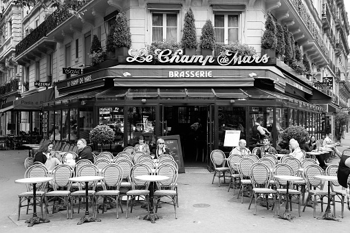 Le Champ de Mars cafe in Paris, France. Le Champ de Mars cafe is a typical establishment for Paris, one of largest metropolitan areas in Europe.