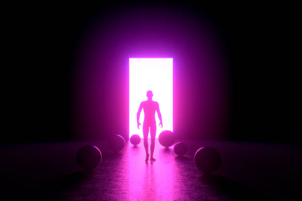 istock Man walking to the lighted door. 1312643926