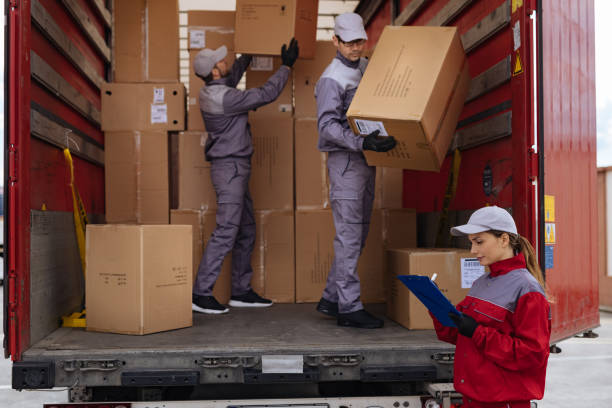 istock A group of delivery workers loading a delivery truck 1312645408