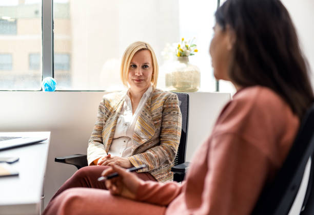 istock Businesswomen Discussing In The Office 1312645686
