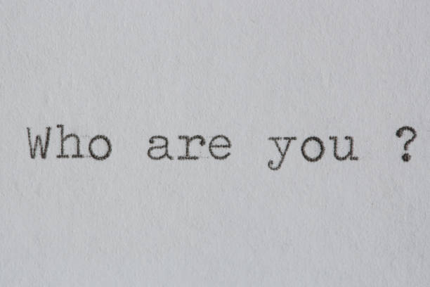 istock Who are you text on white paper typed on a vintage typewriter 1312648878