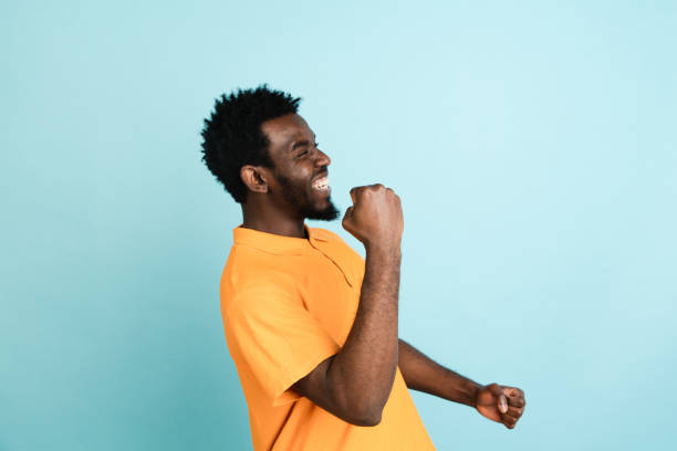 istock African man's portrait isolated over blue studio background with copyspace 1312649665