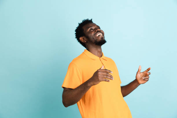istock African man's portrait isolated over blue studio background with copyspace 1312649689