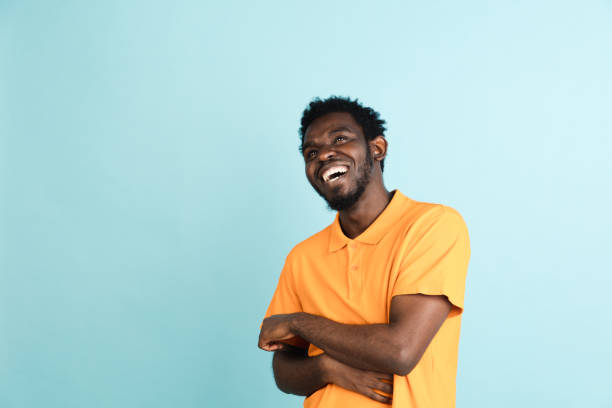 istock African man's portrait isolated over blue studio background with copyspace 1312649690