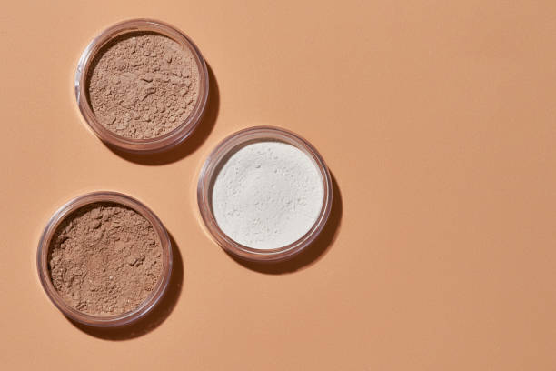 istock Round cans filled with cosmetological powder without caps 1312653222