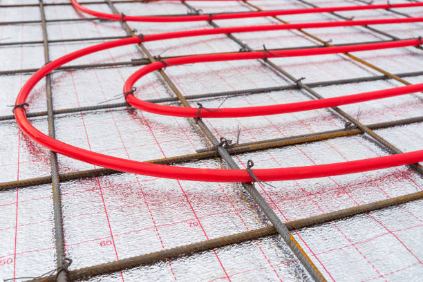 istock Underfloor plumbing pipes water heating installation before the screed. 1312653939