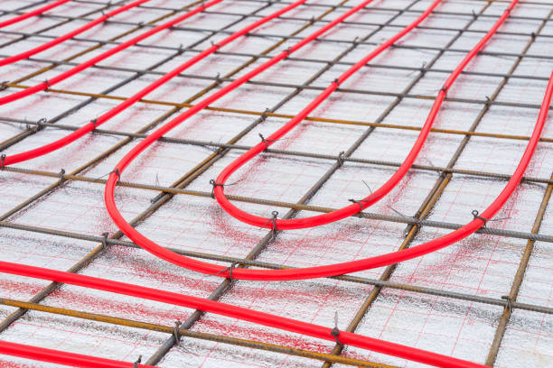 istock Underfloor plumbing pipes water heating installation before the screed. 1312653942