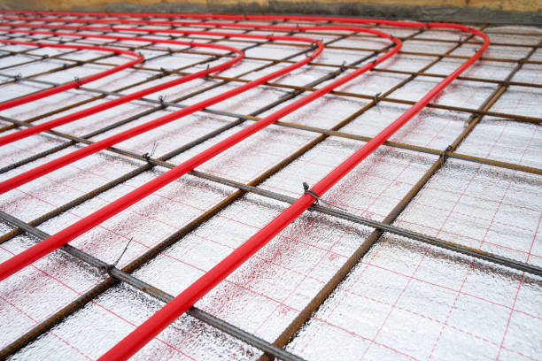 istock Underfloor plumbing pipes water heating installation before pouring the screed. 1312653953