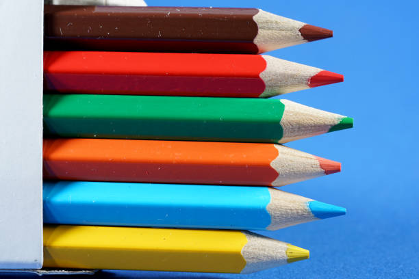 istock Colorful crayons, pencils with plain paper as a background with structure 1312655748