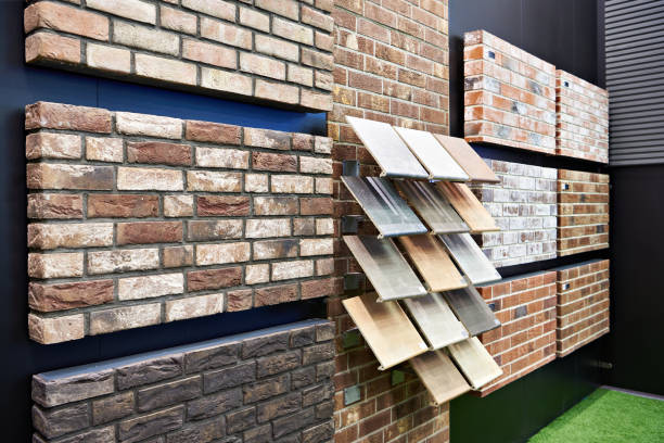 This high-resolution 4K image showcases a beautifully arranged wall of natural sandstone tiles. The warm, earthy tones and unique textures of the stone create a visually appealing backdrop, perfect for various applications in design and architecture. Ideal for use in interior design projects, backgrounds, or as a texture overlay, this image captures the elegance of natural materials and adds a touch of sophistication to any setting.