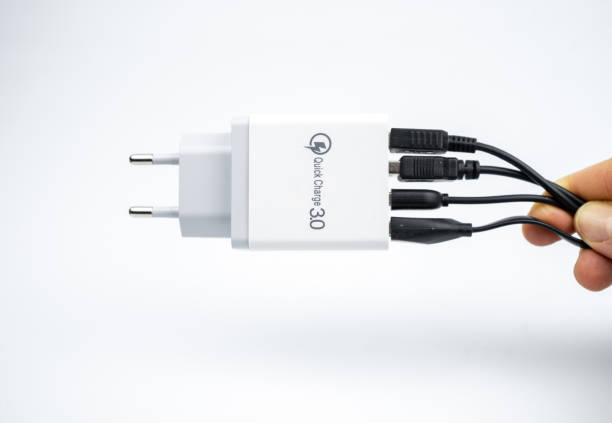 istock Adapter charger with multiport USB ports isolated on white background 1312658946