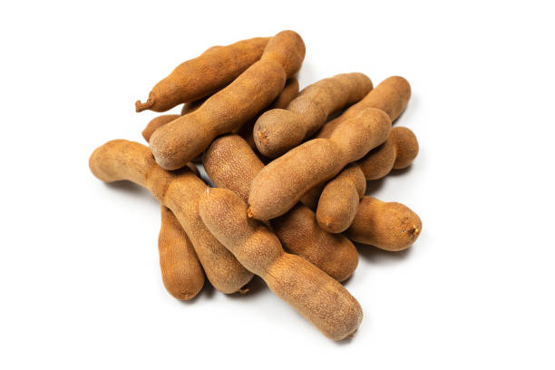istock Sweet tamarind isolated on white background. 1312659020