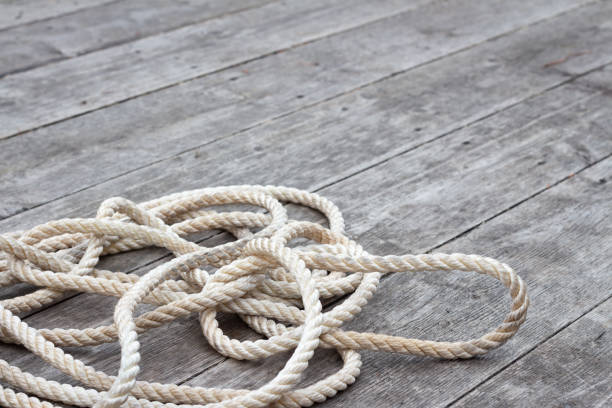 istock Pile of rope on rustic wood 1312660441